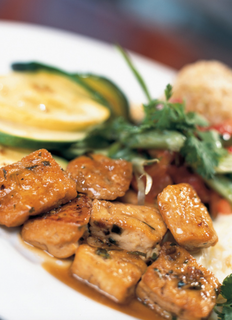 Beautifully plated cubes of tofu with veggies and egg whites