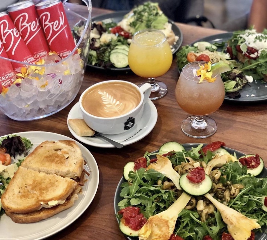 A table filled with brunch items and beverages, elegantly spread out on a table