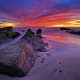 Amazing sunset lights up Windansea Beach in La Jolla, San Diego, California