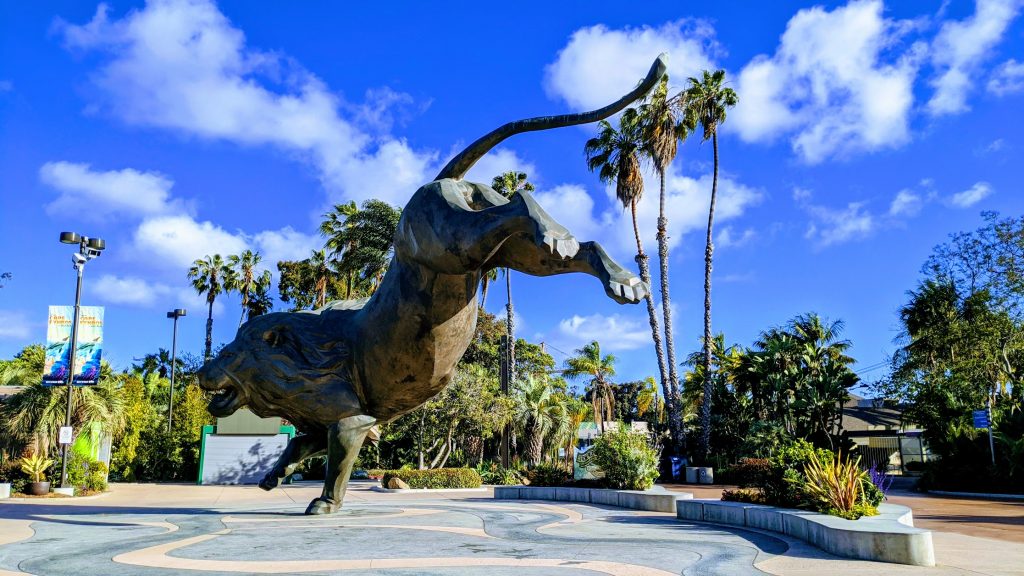 Lion Statue with back feet in the air in front of San Diego Zoo Entrance - Weekend in San Diego Zoo