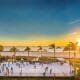 ice rink on the beach in Coronado with palm trees at sunset