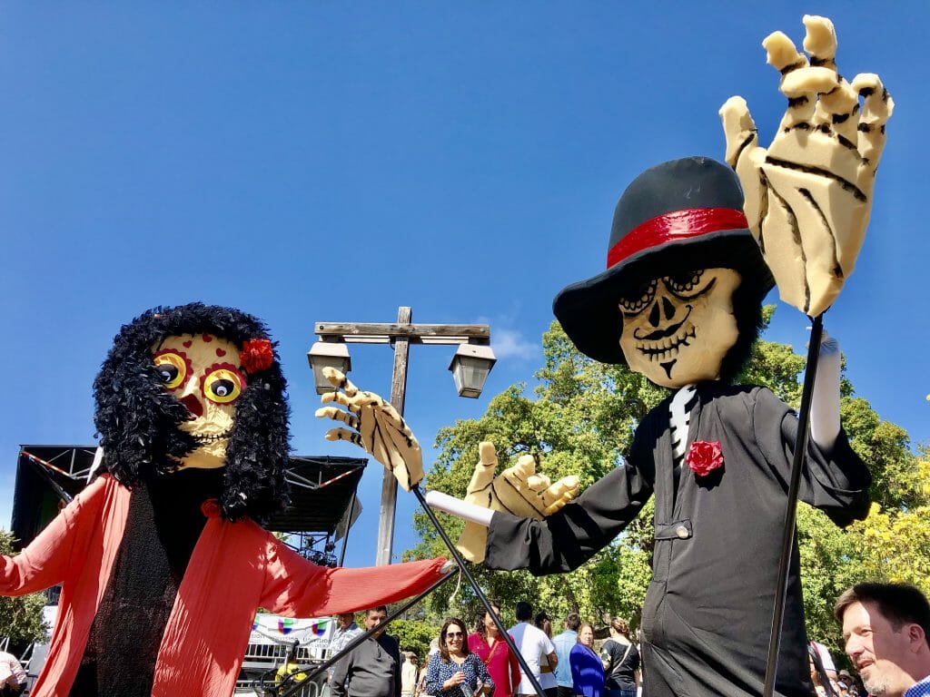 two wood figurines on Cinco de Mayo Old Town San Diego