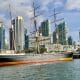 Historic Sailboat Star of India with highrises of San Diego Downtown in the Background