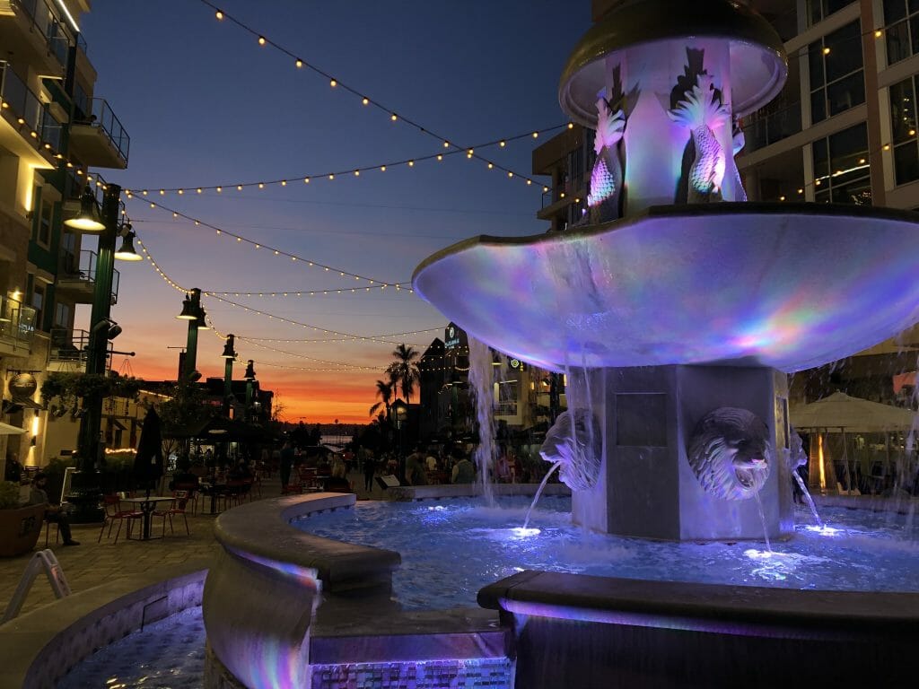 Sunset Piazza Della Famiglia with purple lid up fountain in the foreground