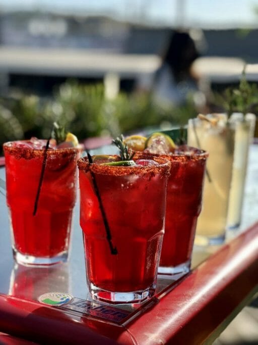 Red and yellow cocktails on a bar at telefonica gastro park