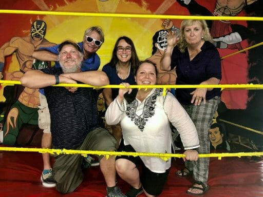 5 people posing in a Lucha libre ring at the Mullme Museum Tijuana