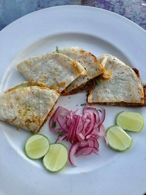 Rabbit Quesadillas with red onions and lime wedgesTelefonica Gastropark