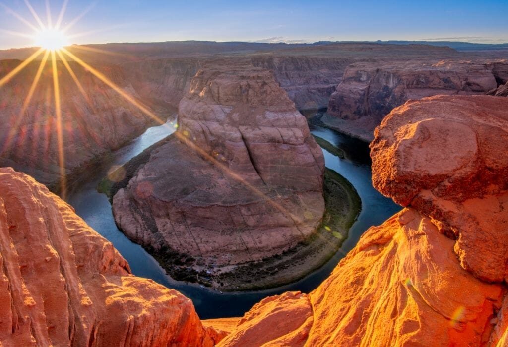 Red rock formations and almost round river bend in a canyon in Northern Arizona - Flagstaff Day trip to horseshoe Bend Northern Arizona 