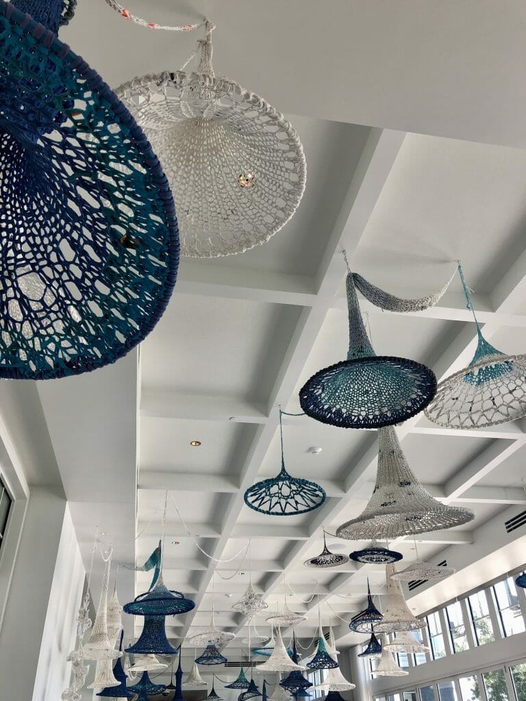 Blue and white macrame ceiling art at The Seabird Resort Oceanside