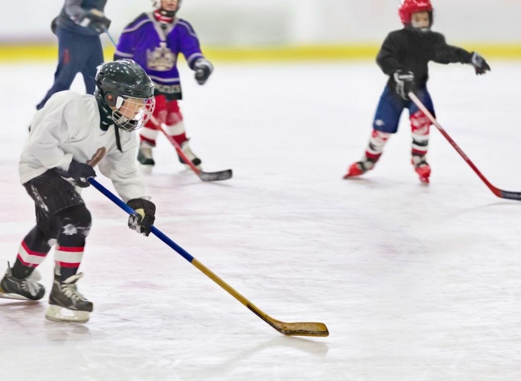 Kids playing Ice Hockey