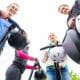 People on Segways parked in a circle looking down into the camera below. San Diego Segway Tours