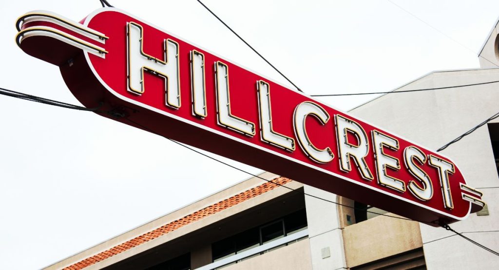 Red, retro sign reading Hillcrest. Hillcrest neighborhood San Diego