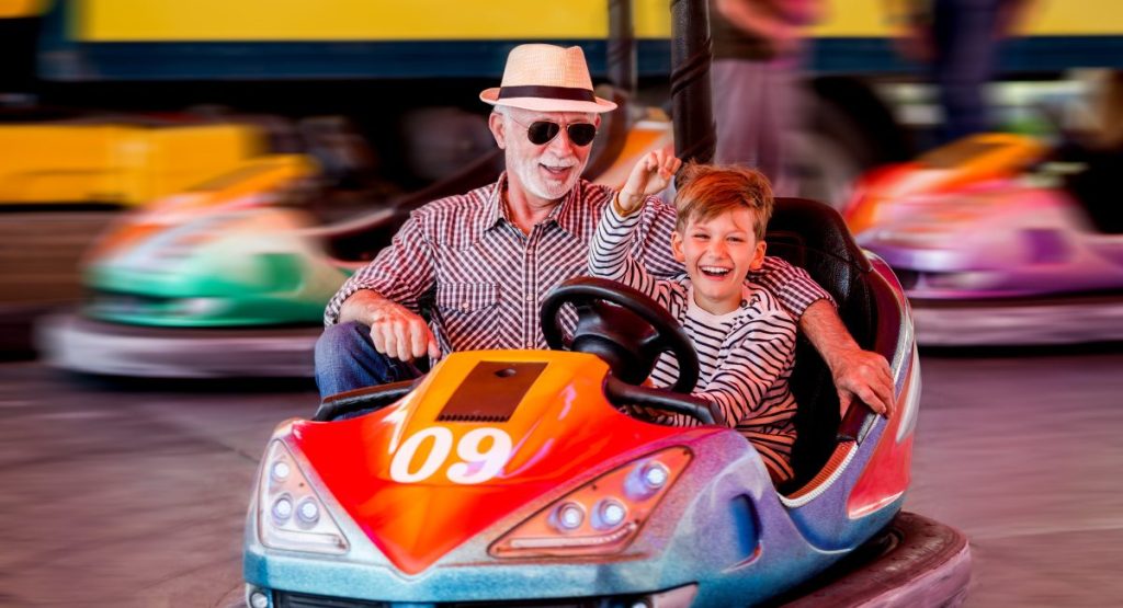 A family enjoying bumper car ride in San Diego