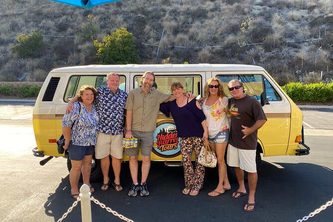 6 people standing in front of vintage yellow VW bus for San Diego Brewery Tours