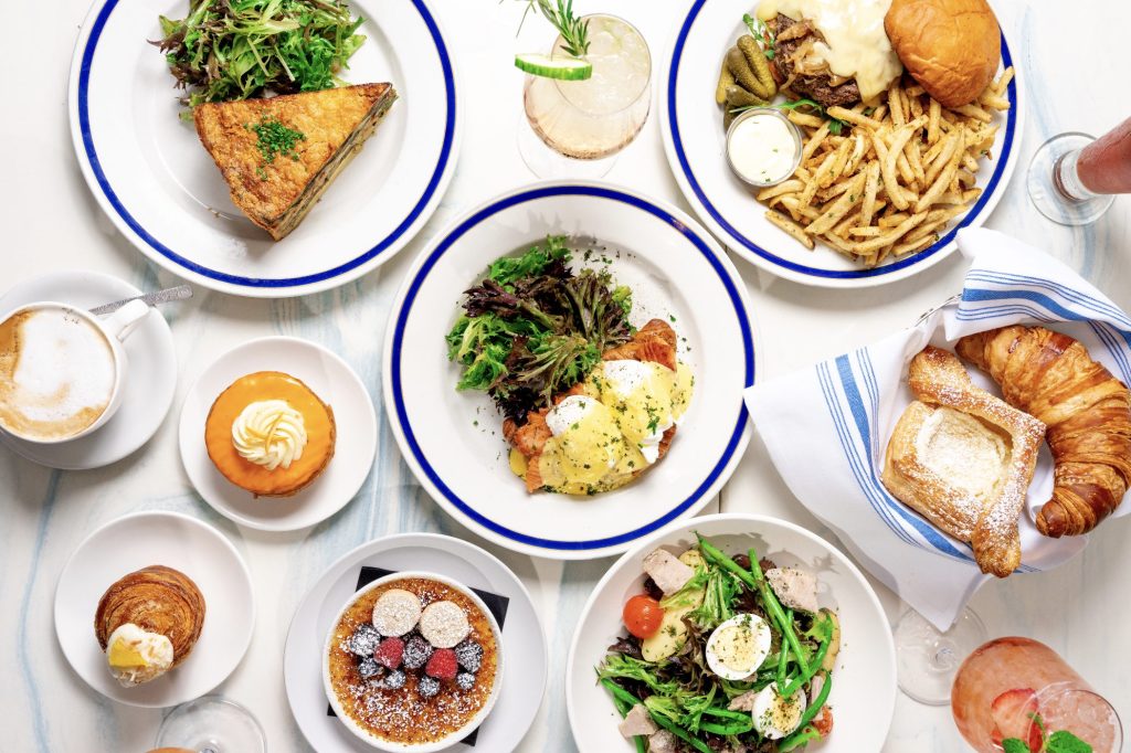 Flatlay photo of brunch spread at Little Frenchie Coronado