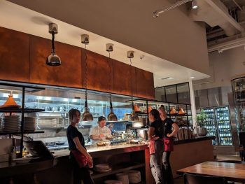 View of open style kitchen at Callie restaurant in downtown San Diego