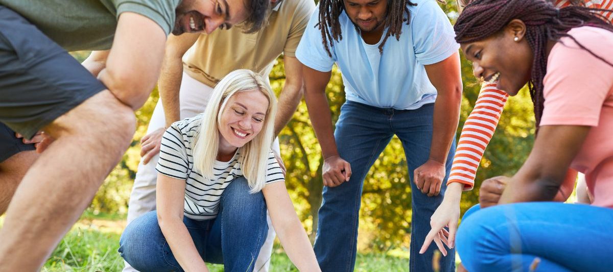 Group of people looking at clues at San Diego Scavenger Hunt Downtown