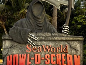 Creepy sign for Howl-O-Scream San Diego SeaWorld with "Grim Reaper"