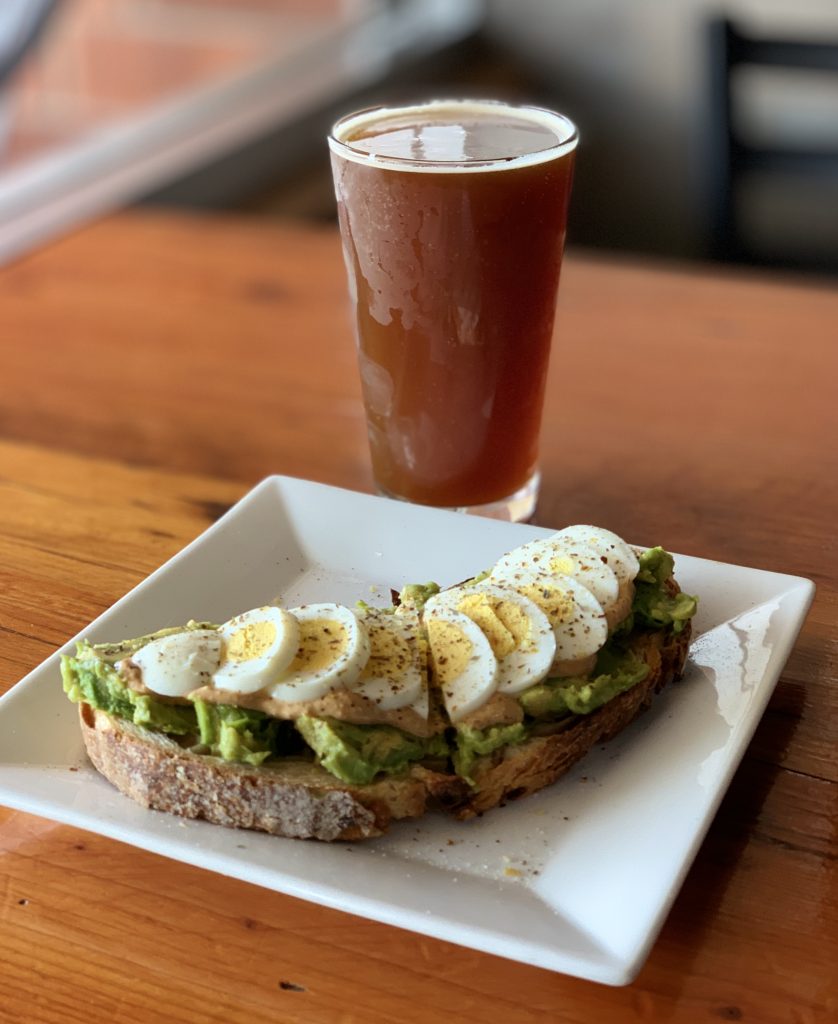 Avocado toast with egg and coffee at Brew Coffee Spot in La Mesa