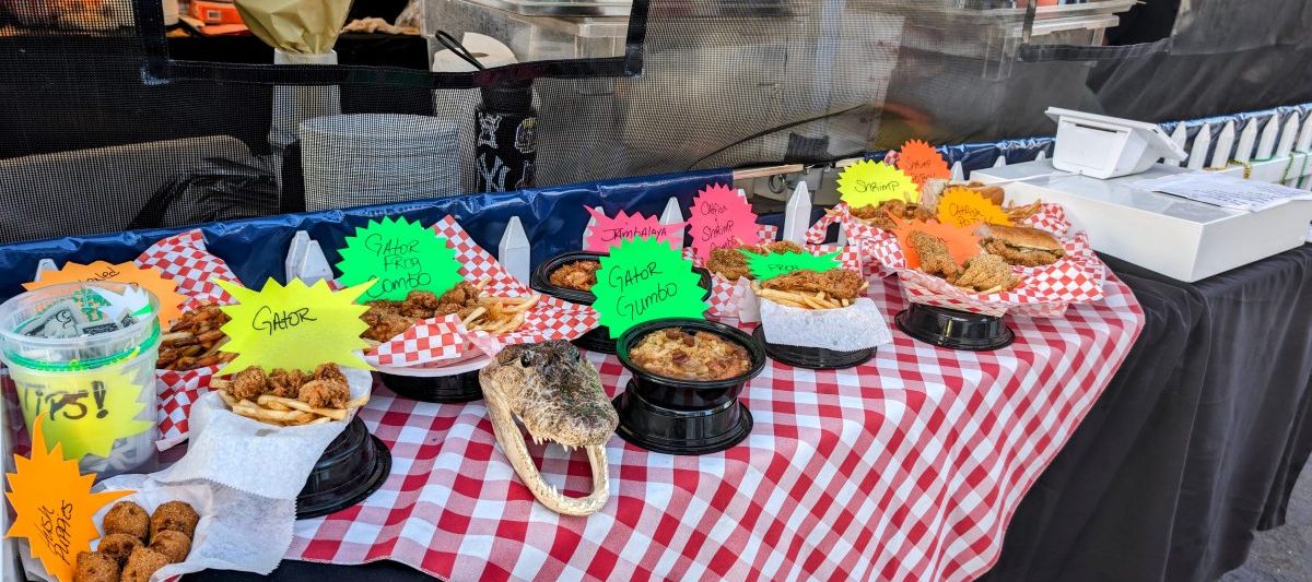 Table with traditional Louisiana fried food at Gator by the Bay San Diego