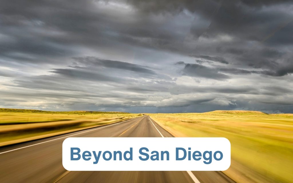 Beyond San Diego - Open Road with Grass fields