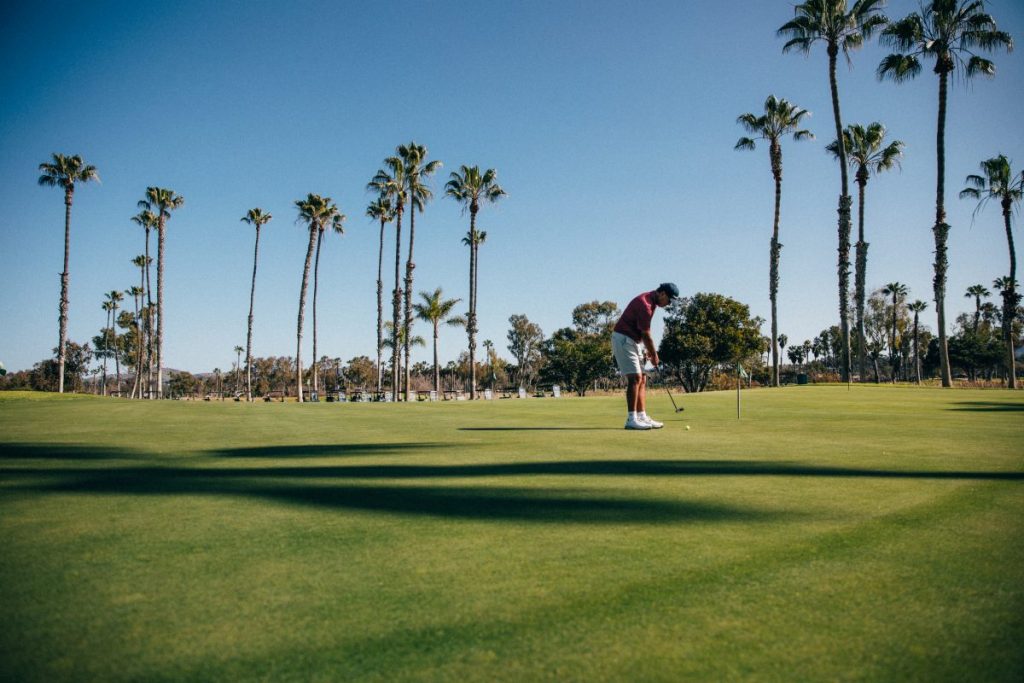 Man playing golf at La Valle Coastal Club