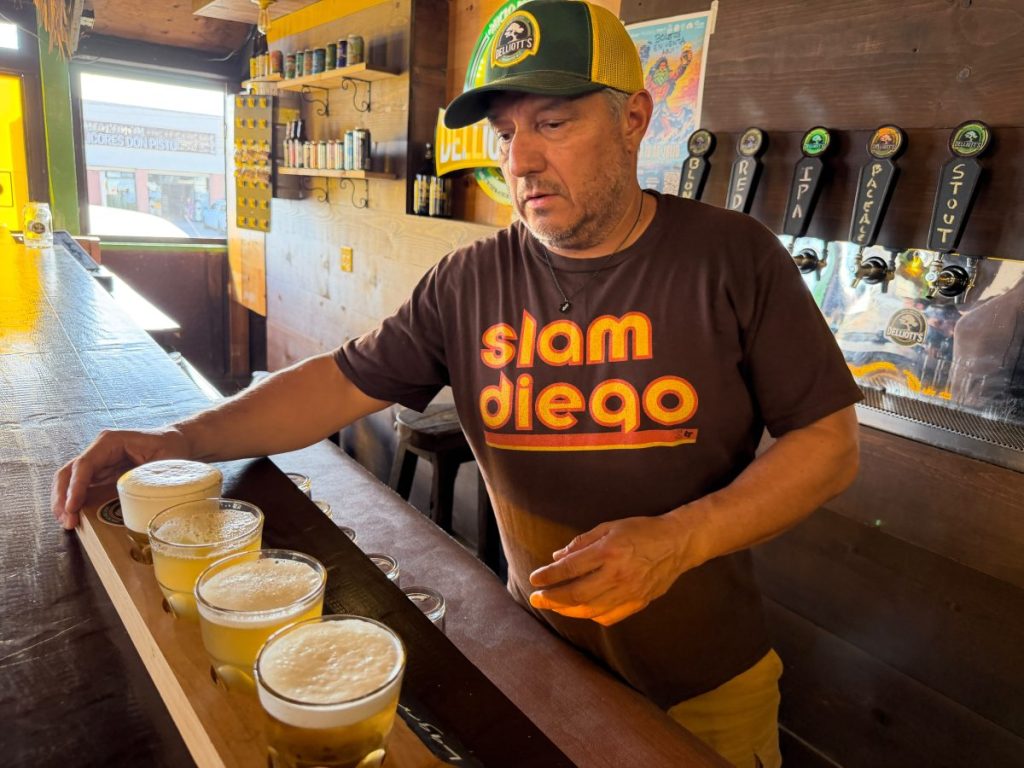 Brewery Owner Jorge  pouring beer at his Rosarito Brewery Delliotts