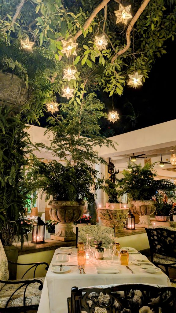 Puerto Vallarta restaurant Le Bistro outdoor seating under trees